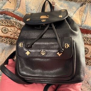 MCM Black Backpack with Gold hare ware.